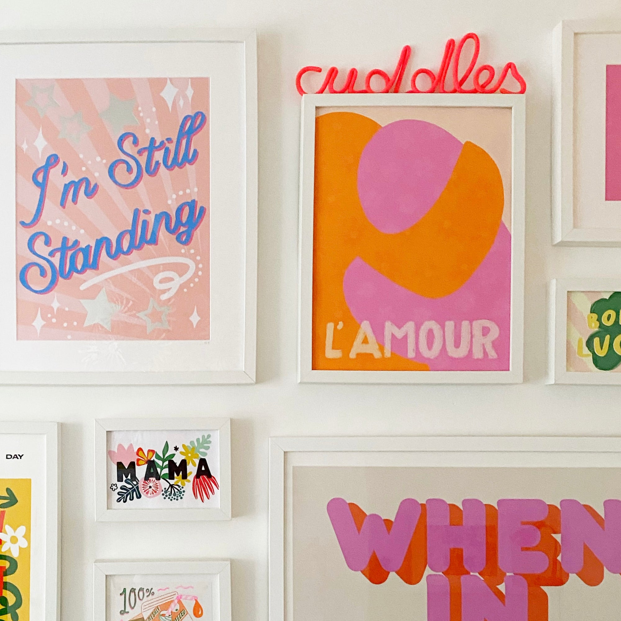 Gallery wall with colourful Prints 