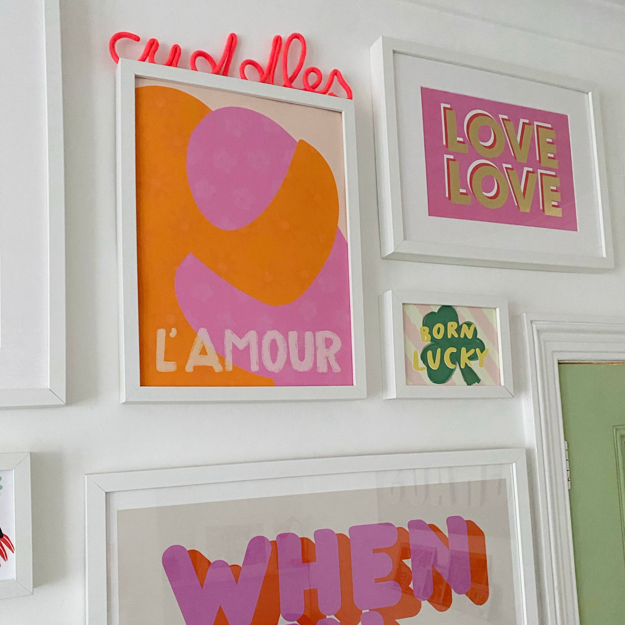 L'Amour Print hanging on wall 