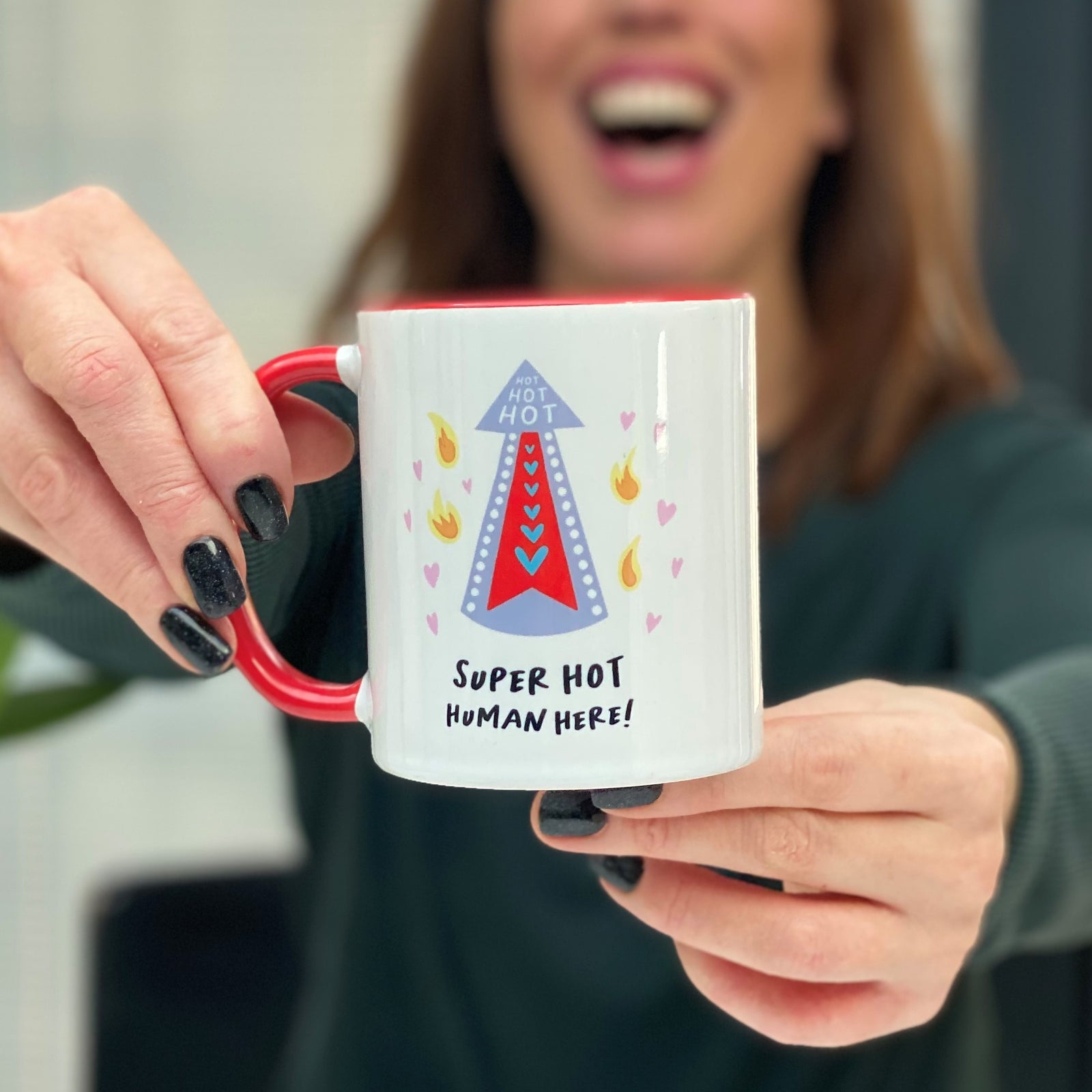 china mug with red handle with super hot human arrow design