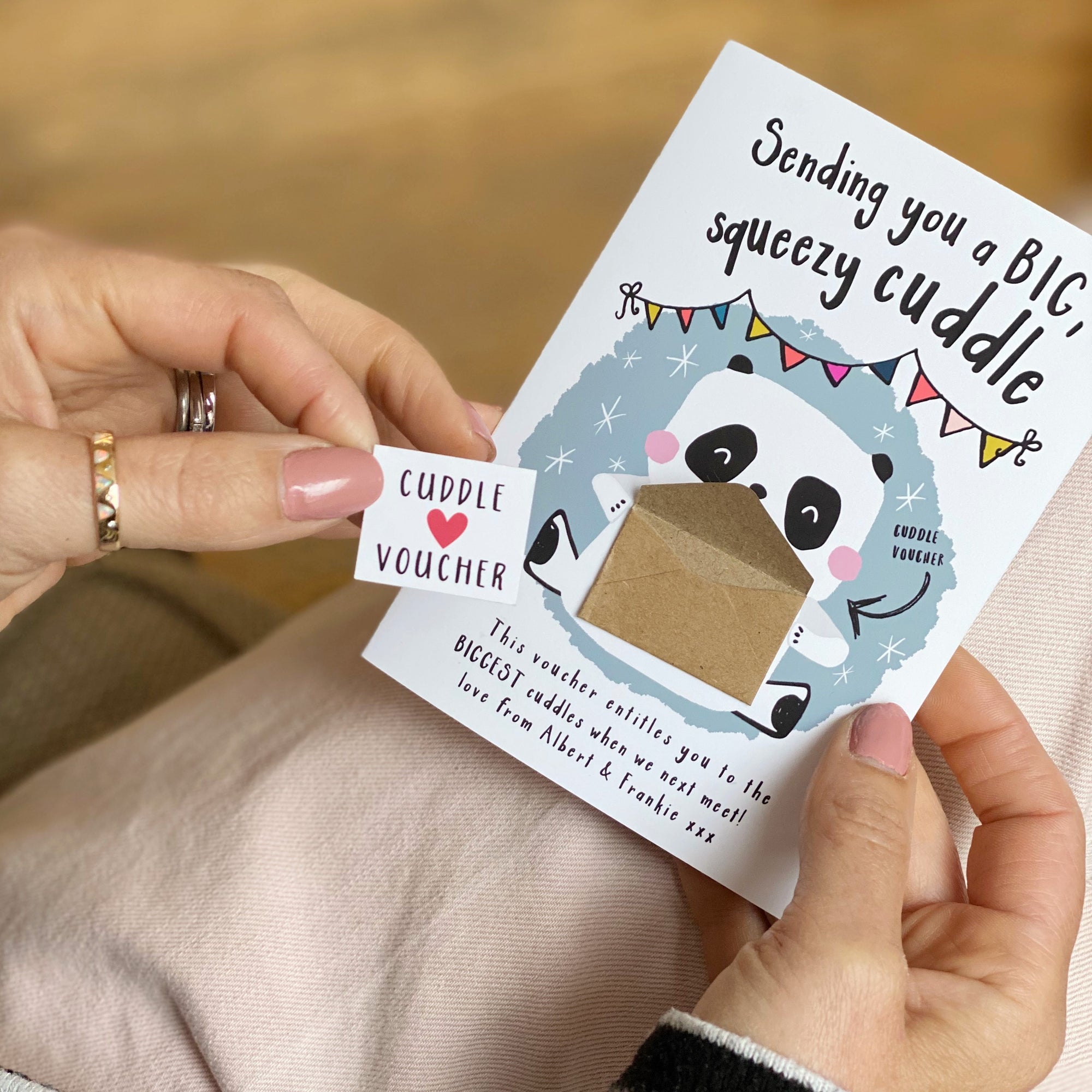 Sending a Cuddle Voucher Greeting Card