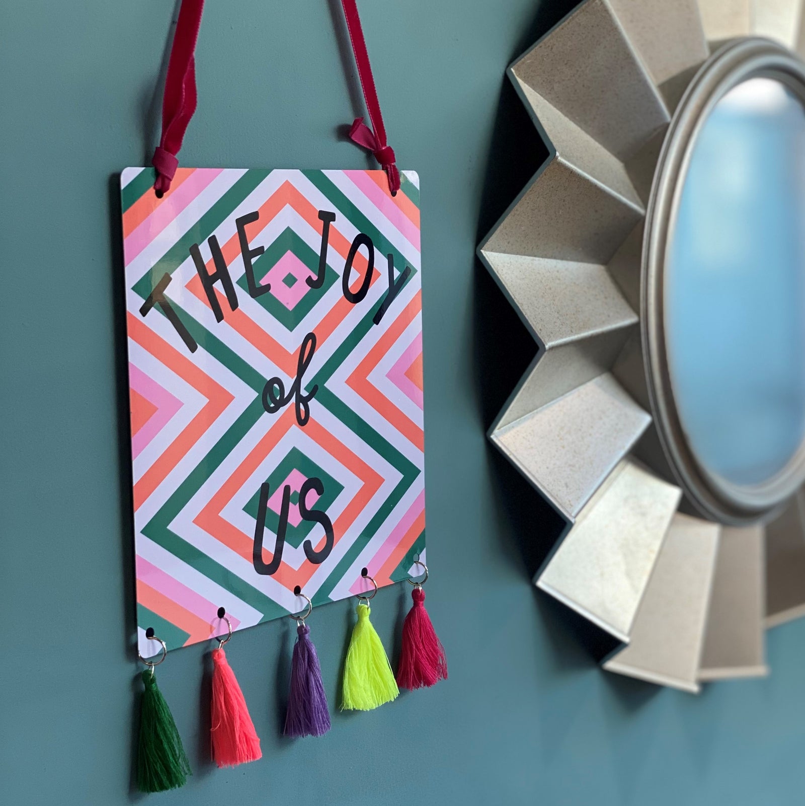 The Joy Of Us Tasselled Geometric Sign Orange And Pink