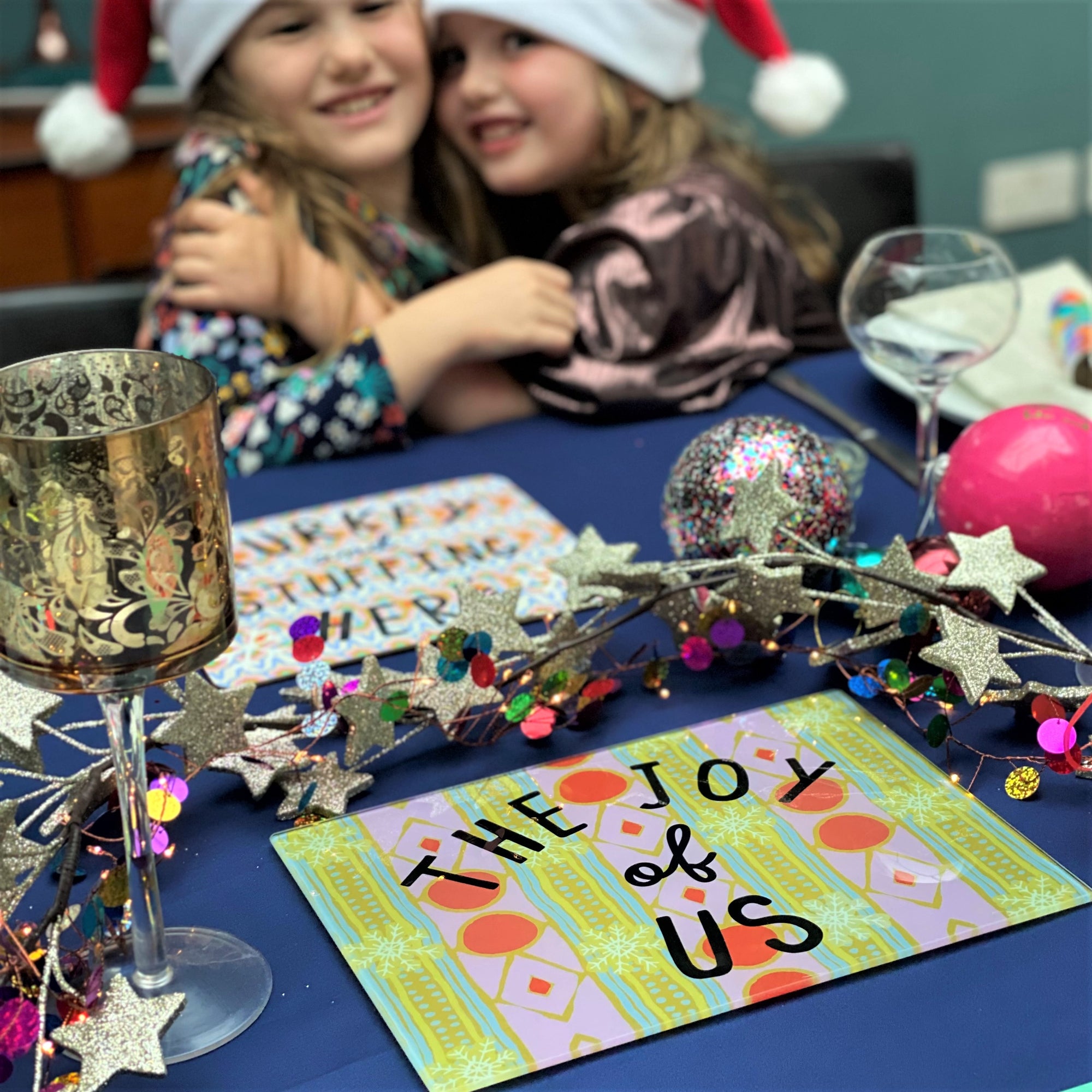 Festive 'The Joy Of Us' Glass Cutting Board