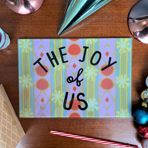 Festive 'The Joy Of Us' Glass Cutting Board